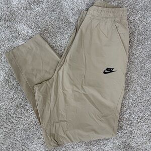 Nike Sportswear Commuter Pants Tan Tech Woven Performance sz XL